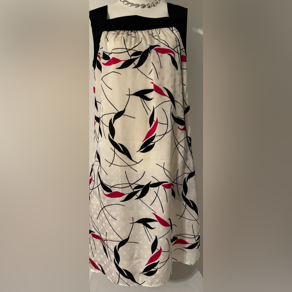 Super cute Mossimo dress with pockets.  Black, pink, and white.  Great condition
